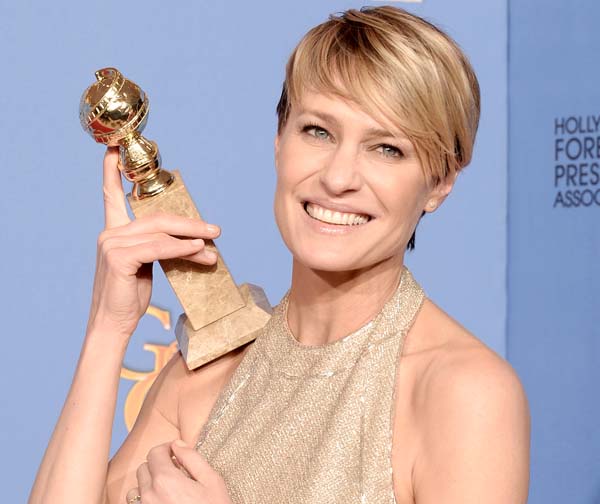 BEVERLY HILLS, CA - JANUARY 12: Actress Robin Wright, winner of Best Actress in a Television Series - Drama for 'House of Cards,' poses in the press room during the 71st Annual Golden Globe Awards held at The Beverly Hilton Hotel on January 12, 2014 in Beverly Hills, California. (Photo by Kevin Winter/Getty Images)